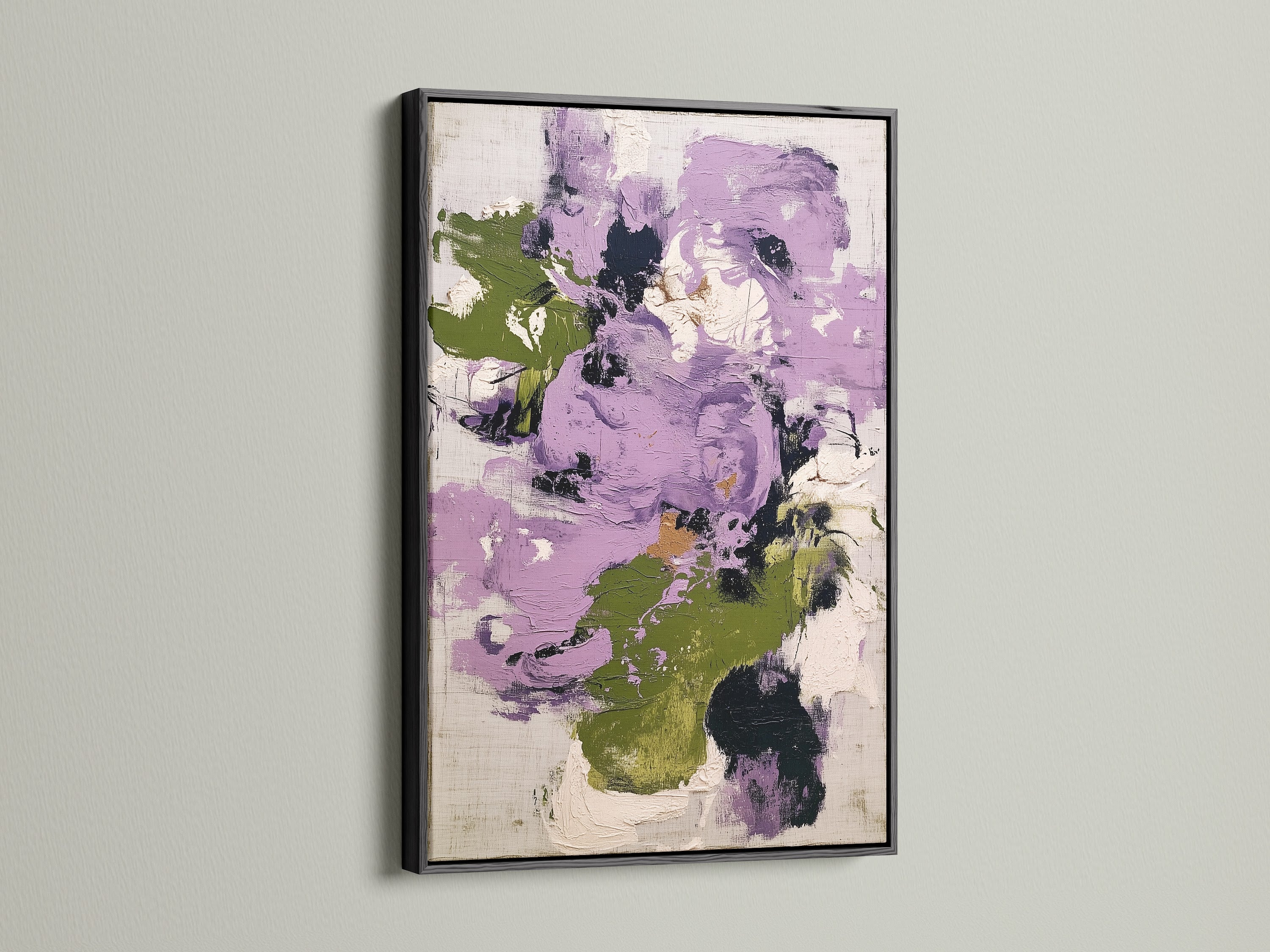 Abstract floral artwork with purple and green shades displayed in a black frame. This modern canvas art adds a sophisticated touch to contemporary decor. The botanical print is perfect for creating a stylish bedroom wall decor with its bold contrast and artistic flair.
