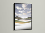Coastal landscape artwork in a black frame. This landscape art adds a touch of sophistication to your decor. The black frame enhances the modern nature photography. A perfect piece of ocean wall decor. Bring the beauty of the beach to your home with this serene nature print.