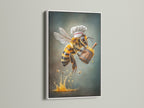 Chef Bee artwork displayed in a white frame. The honey bee chef poster brings charm to any kitchen. It is a perfect whimsical addition to your dining room or restaurant decor. Explore this delightful kitchen canvas art today.