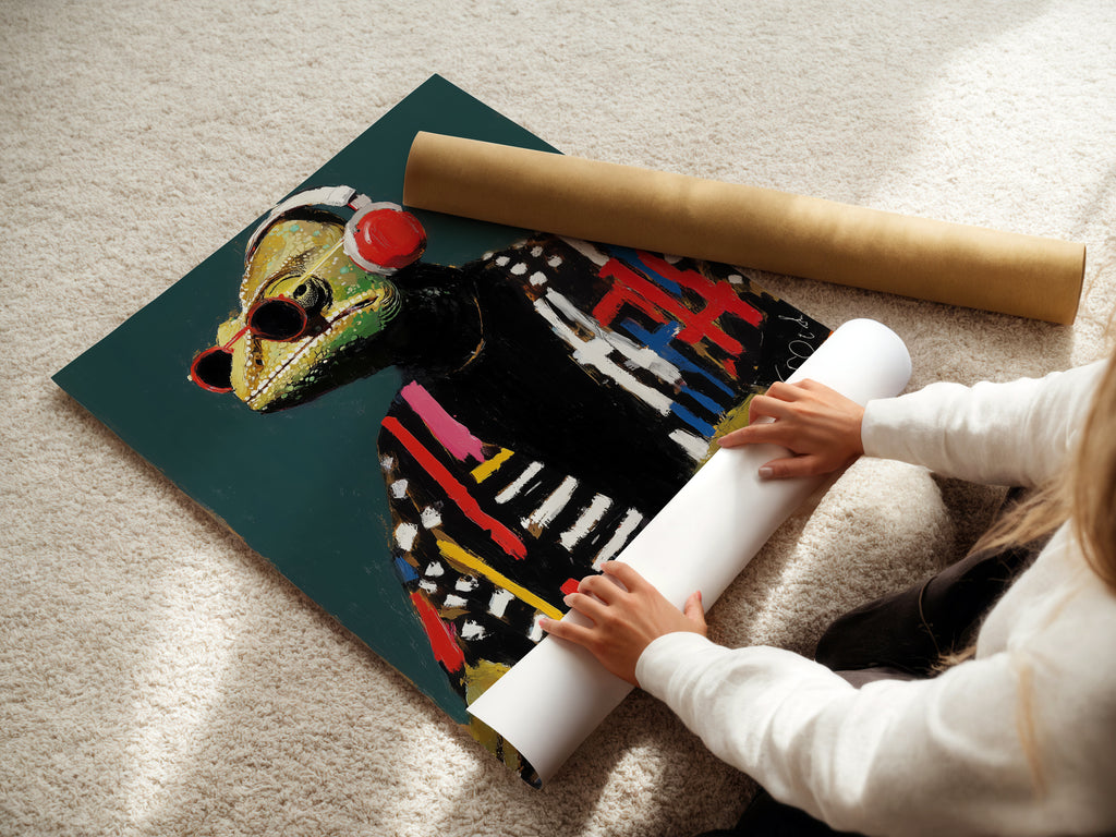 A woman is carefully rolling a fine art poster paper of the DJ Iguana. This ensures the music wall art arrives in perfect condition. The poster is ideal for framing or hanging as is. It's a great reptile art print for any space.