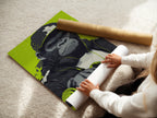 A woman carefully rolls a fine art poster paper. This showcases the material used for the gorilla workout art print. High-quality paper ensures a lasting piece of fitness wall art. The fine art poster paper is ideal for detailed urban animal artwork. It is perfect for any art lover.