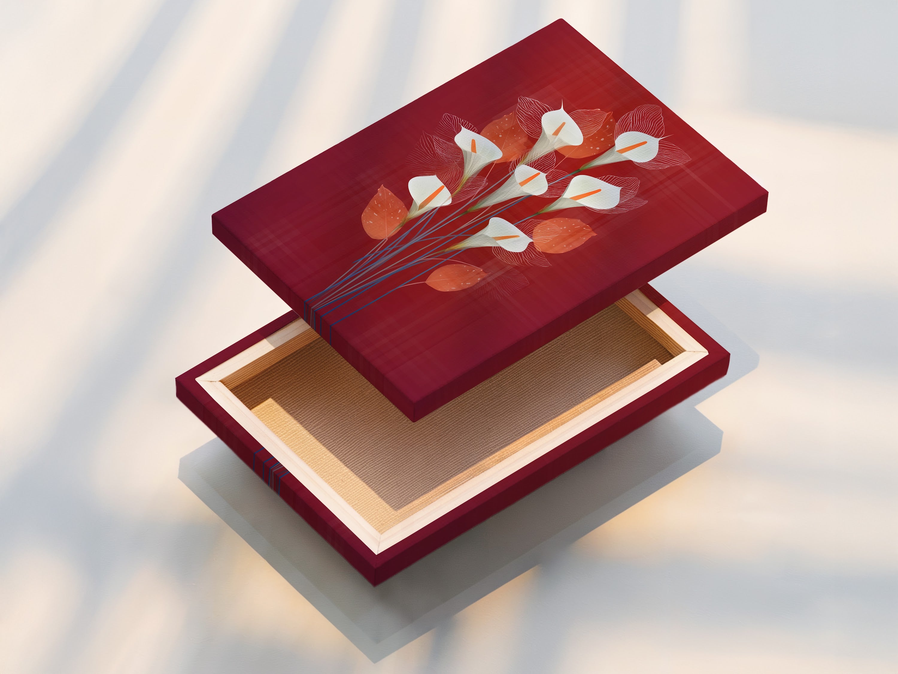 A stretched canvas print of the calla lily artwork is displayed. The stretched canvas provides a ready-to-hang floral artwork option. Perfect for adding burgundy decor to your living room. Enjoy the beauty of botanical art on canvas.