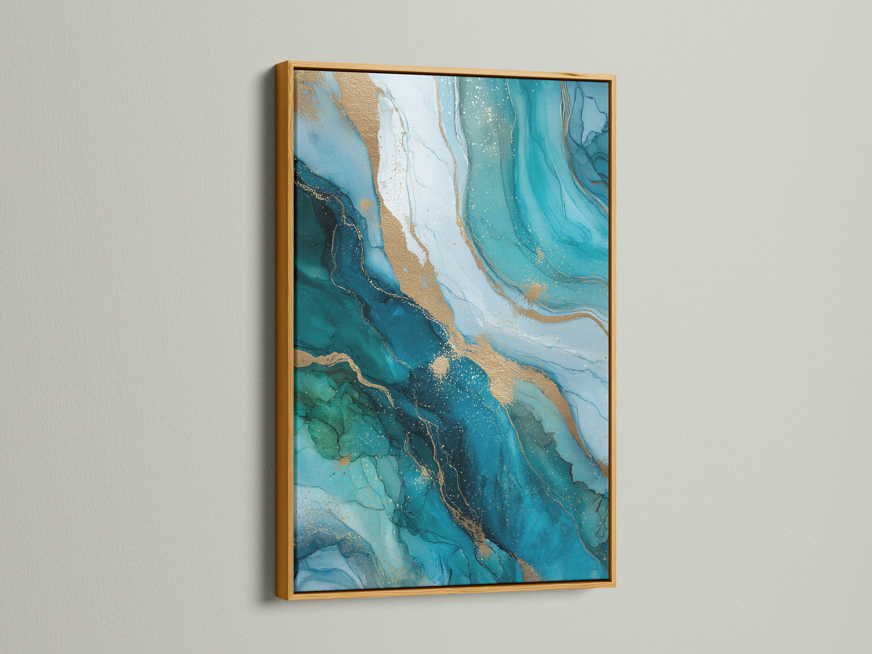 This image displays the abstract ocean artwork with teal blue and gold in a gold frame. The gold frame enhances the luxury feel. Add this geode canvas art to your living room. Elevate your home with this stunning piece of wall art.