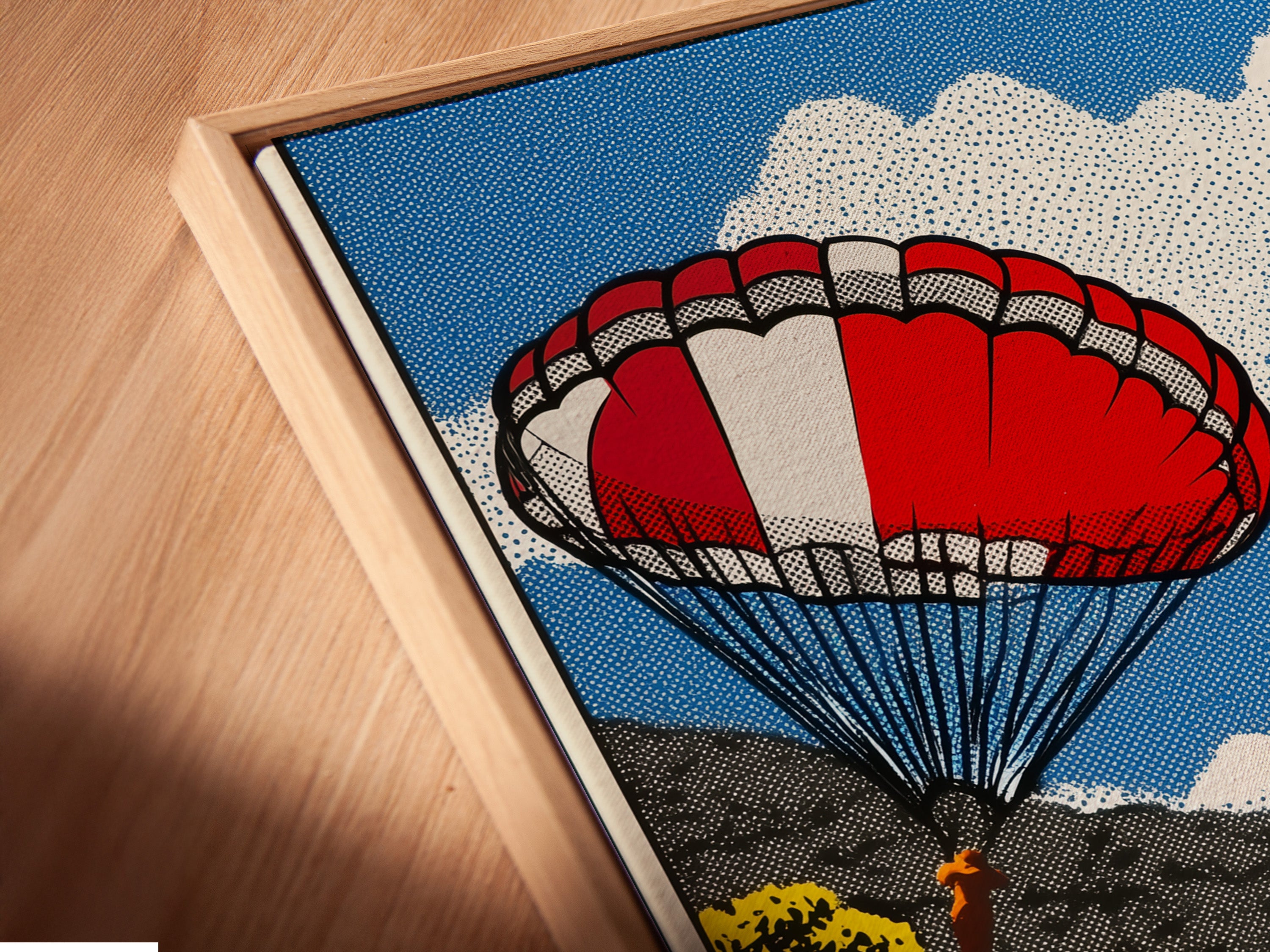 A close-up angled view of a canvas print. It is displayed in a floating frame. The artwork appears to hover within the frame. This creates a modern and eye-catching display.