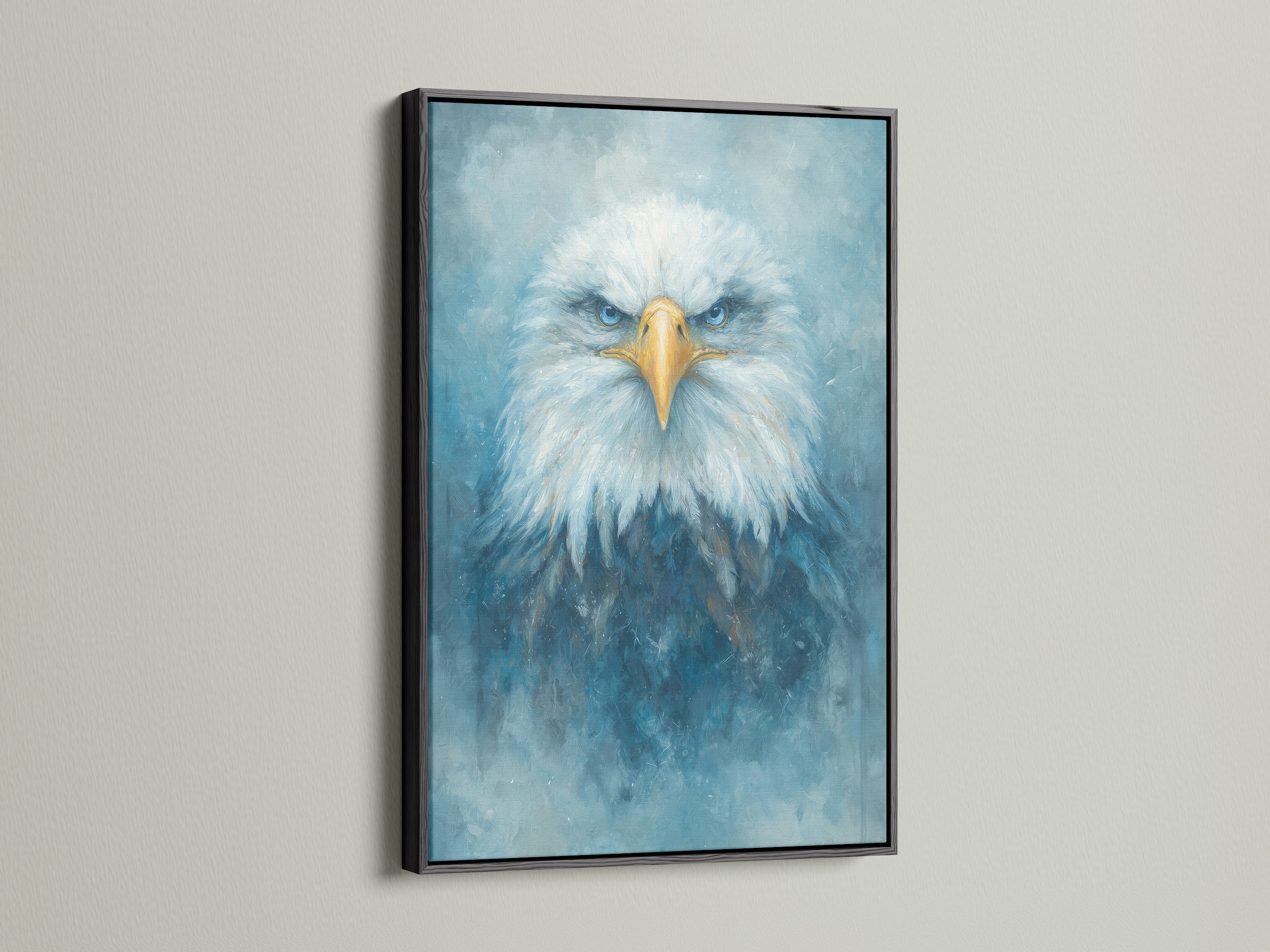 The stunning eagle portrait is framed in sleek black. The artwork features a majestic bird with piercing blue eyes. It brings a modern touch to any space. This captivating wildlife art complements minimalist Scandinavian or contemporary styles.