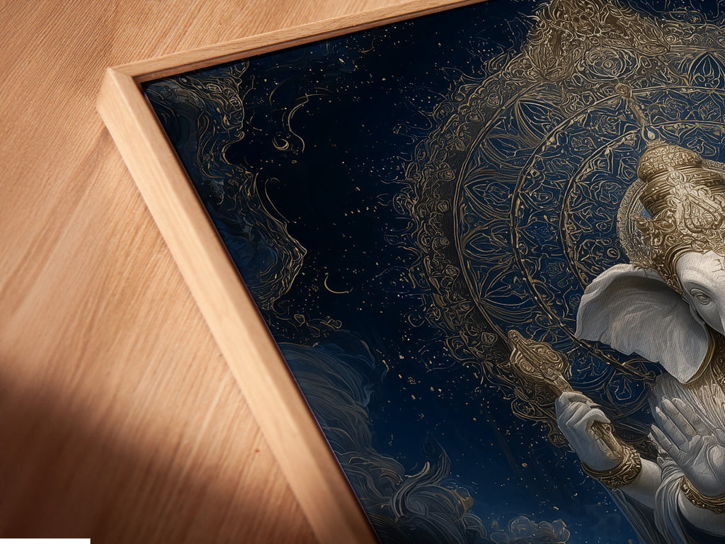 Angled close-up of a Ganesha Canvas Print. It's displayed in a floating frame. This sacred art print enhances any eclectic space. Perfect for yoga instructors and interior designers to create elevated spiritual spaces.
