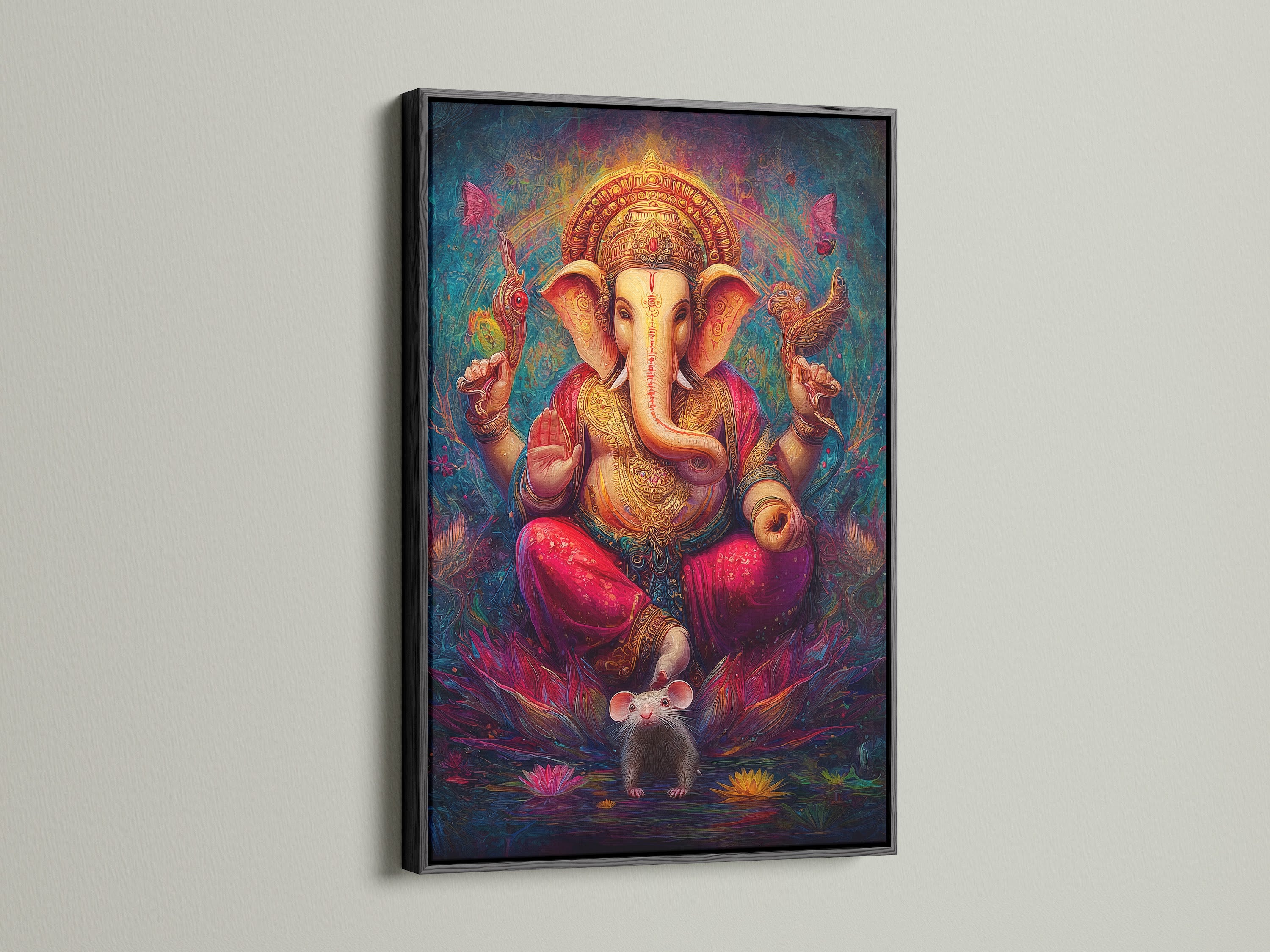 Ganesha Canvas Print in a black frame. This spiritual wall decor adds a touch of bohemian art. The Hindu God canvas is perfect for a meditation room. This sacred artwork features an elephant god print. It is colorful spiritual art for your home.
