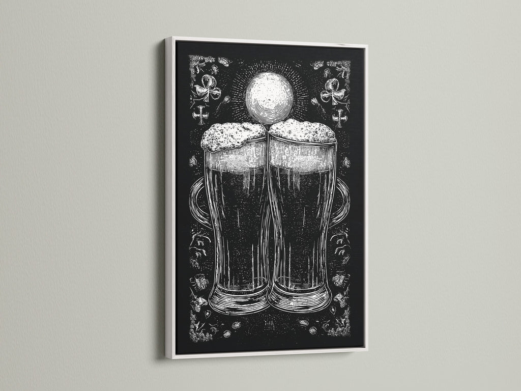 A framed artwork is on display. The art is in a white frame. The artwork features a monochromatic illustration of two beer glasses. The beer glasses are the focal point.  The print adds a touch of elegance to any room. The white frame provides a clean look.