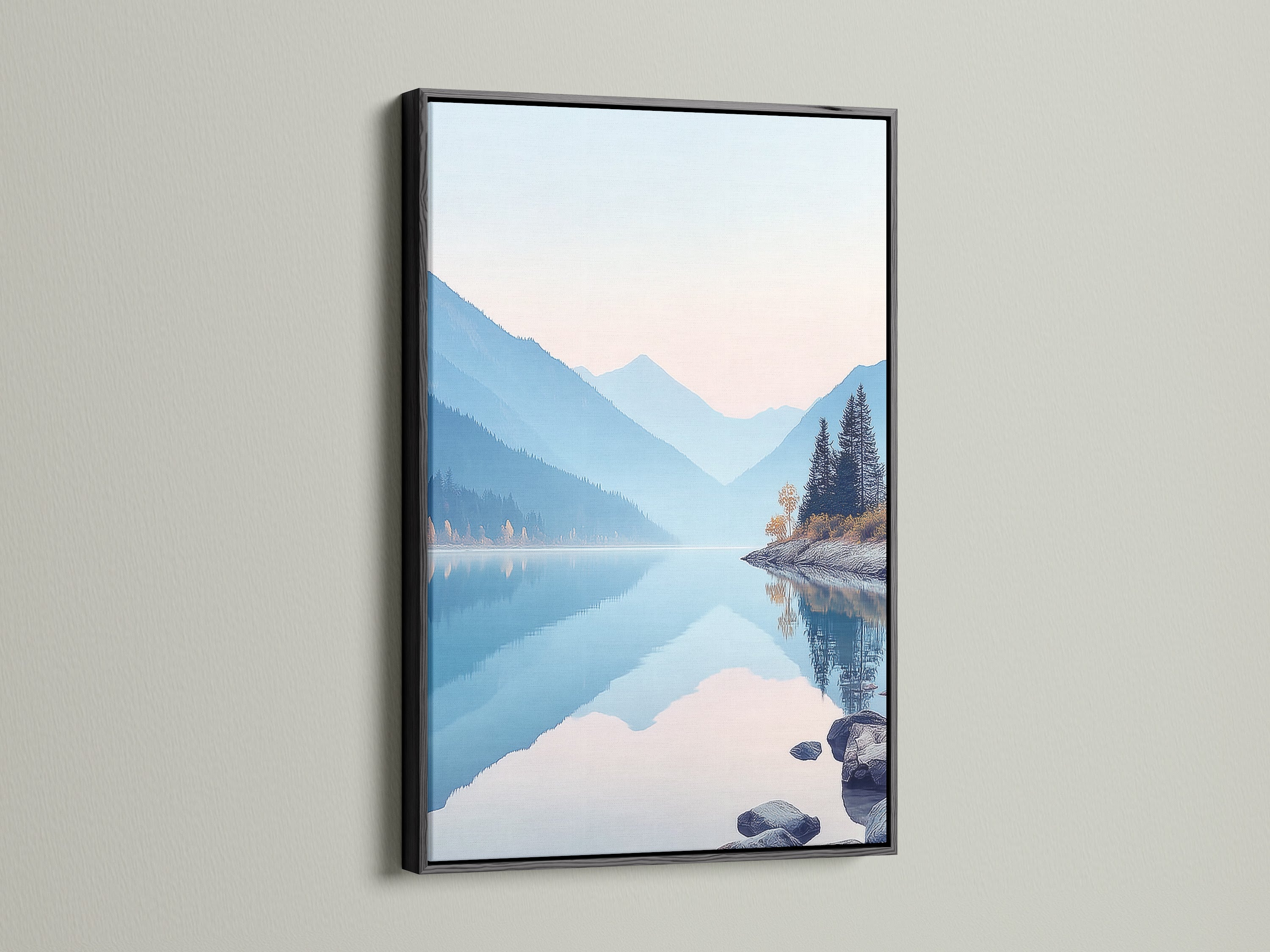 Black frame displays a beautiful mountain lake artwork. The serene nature landscape photography brings a calming effect. The pastel blue wall art enhances any room. It is ideal for bedroom wall decor. The nature canvas print creates a peaceful mountain view. Complements modern spaces.