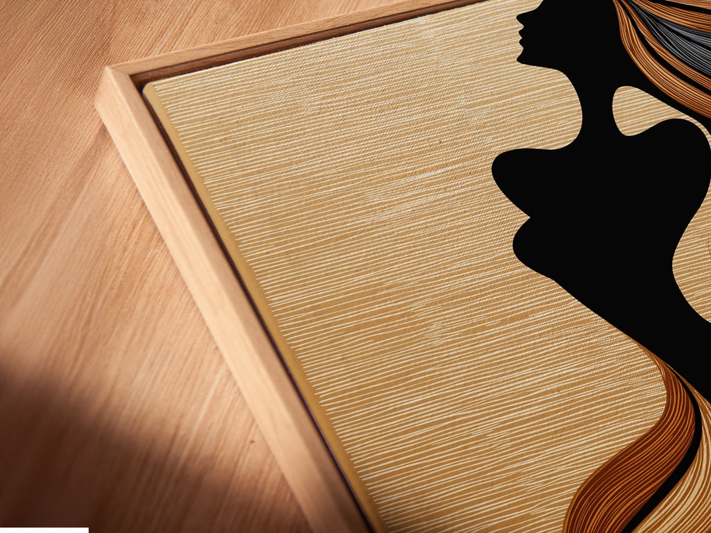 A close-up of the canvas print in a floating frame. The woman silhouette artwork features flowing hair. This bohemian figure art is perfect for a bedroom. The floating frame adds a modern touch. It enhances the artwork's visual appeal. This artwork is ideal for minimalist and contemporary settings.