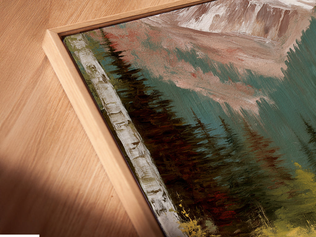 Angled close-up of a Mountain Lake canvas print in a floating frame. The artwork features a teal lake surrounded by a forest and mountains. The floating frame enhances the artwork's modern appeal. Perfect for adding a touch of woodland elegance to any living space. Bring nature indoors.