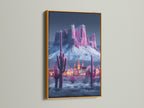Modern Southwestern artwork. A pink cactus and mountain canvas print is displayed in a gold frame. The artwork brings a touch of luxury to your walls. This desert art is perfect for homeowners renters and interior designers.