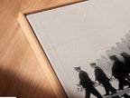 A canvas print of a marching band in a floating frame close up shot. The black and white reflection print is a modern art piece. Ideal for contemporary spaces. Enhance your office wall art study decor or music room with this unique art.