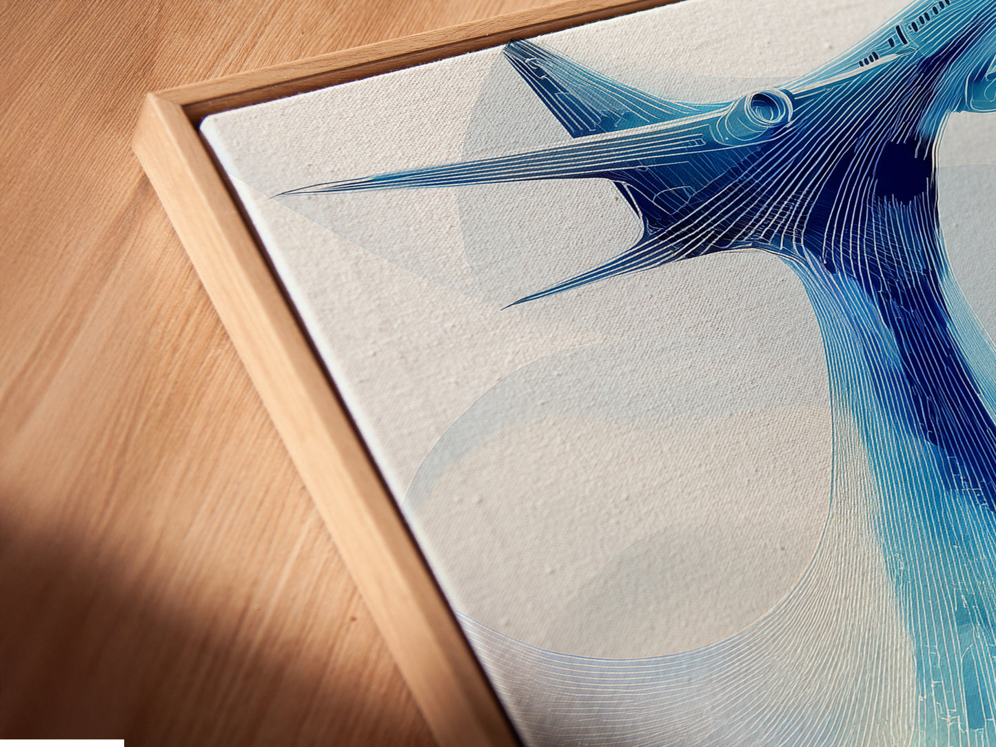 Close up of a canvas print in a floating frame. The airplane art is displayed beautifully. The abstract aviation wall decor offers a modern touch. This teal blue travel poster is a great gift for pilots.