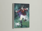 A soccer player canvas art piece with an abstract sports theme is displayed in a white frame. The artwork is a dynamic action painting. This sports wall art is perfect for minimalist Scandinavian or eclectic styles. It will enhance any room.