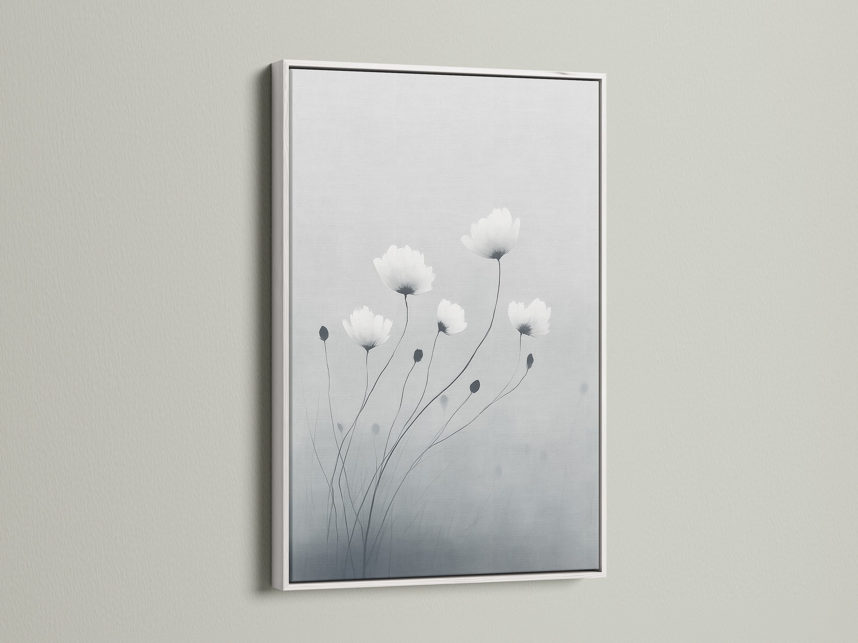 Elevate your space with minimalist flower art in a white frame. The botanical print features soft gray and white hues. This modern canvas art is perfect for bedroom wall decor. White frames create a clean contemporary look for delicate flower artwork.