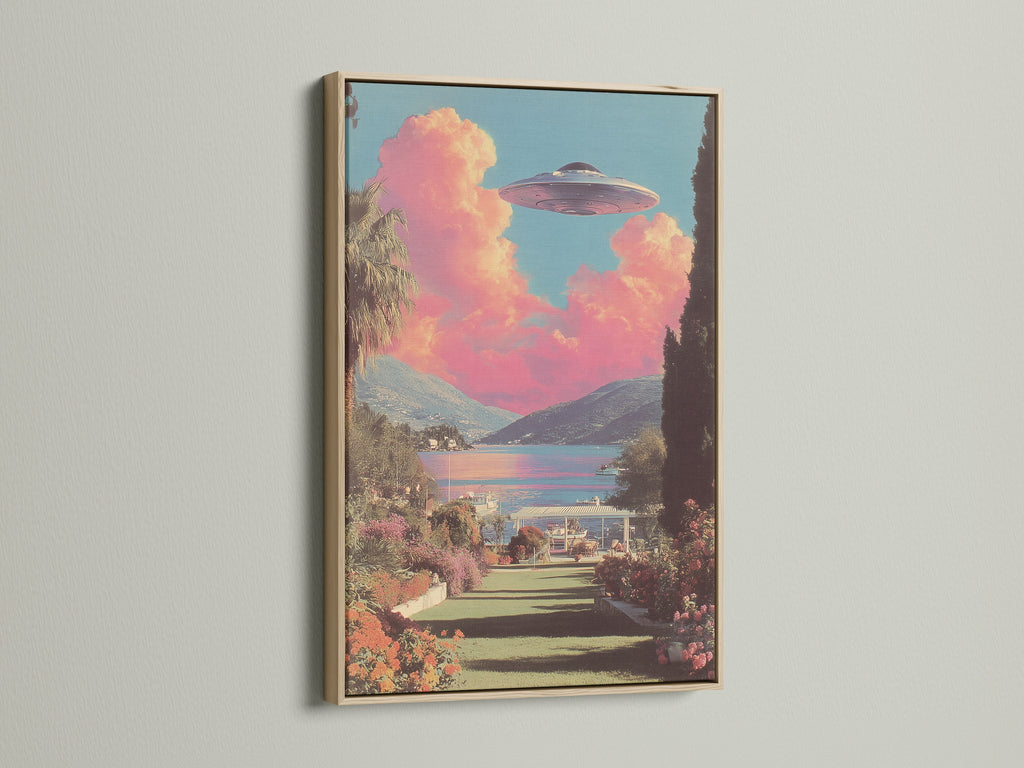 Retro Sci-Fi Wall Decor: A surreal landscape featuring UFO wall art in an oak frame. The primary color is pink. The secondary color is blue. The alien art canvas elevates living room wall art. It fits mid-century modern eclectic styles perfectly.