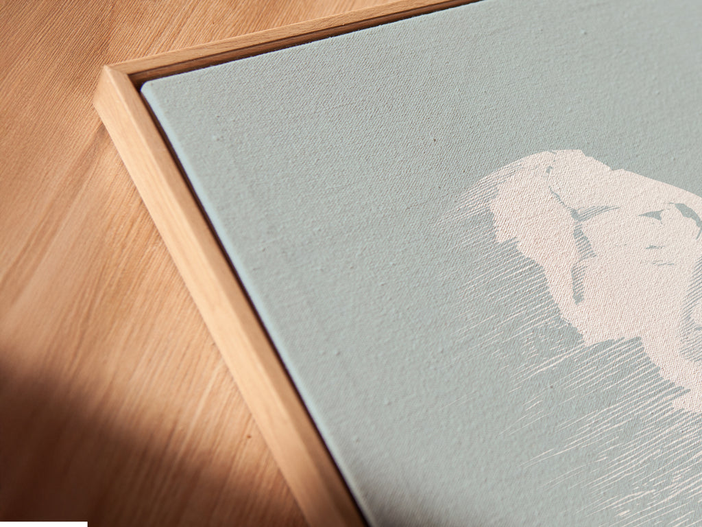 Close up view of the canvas print in a floating frame. The floating frame gives the artwork a unique look. It adds depth to the minimalist art. Perfect for a modern art print. The frame enhances the artwork's beauty.