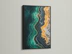 Stunning abstract ocean artwork. The emerald green teal and gold colors swirl together in this modern fluid artwork. A black frame provides a bold contrast to this emerald green art. Transform your wall with this luxurious wall art.