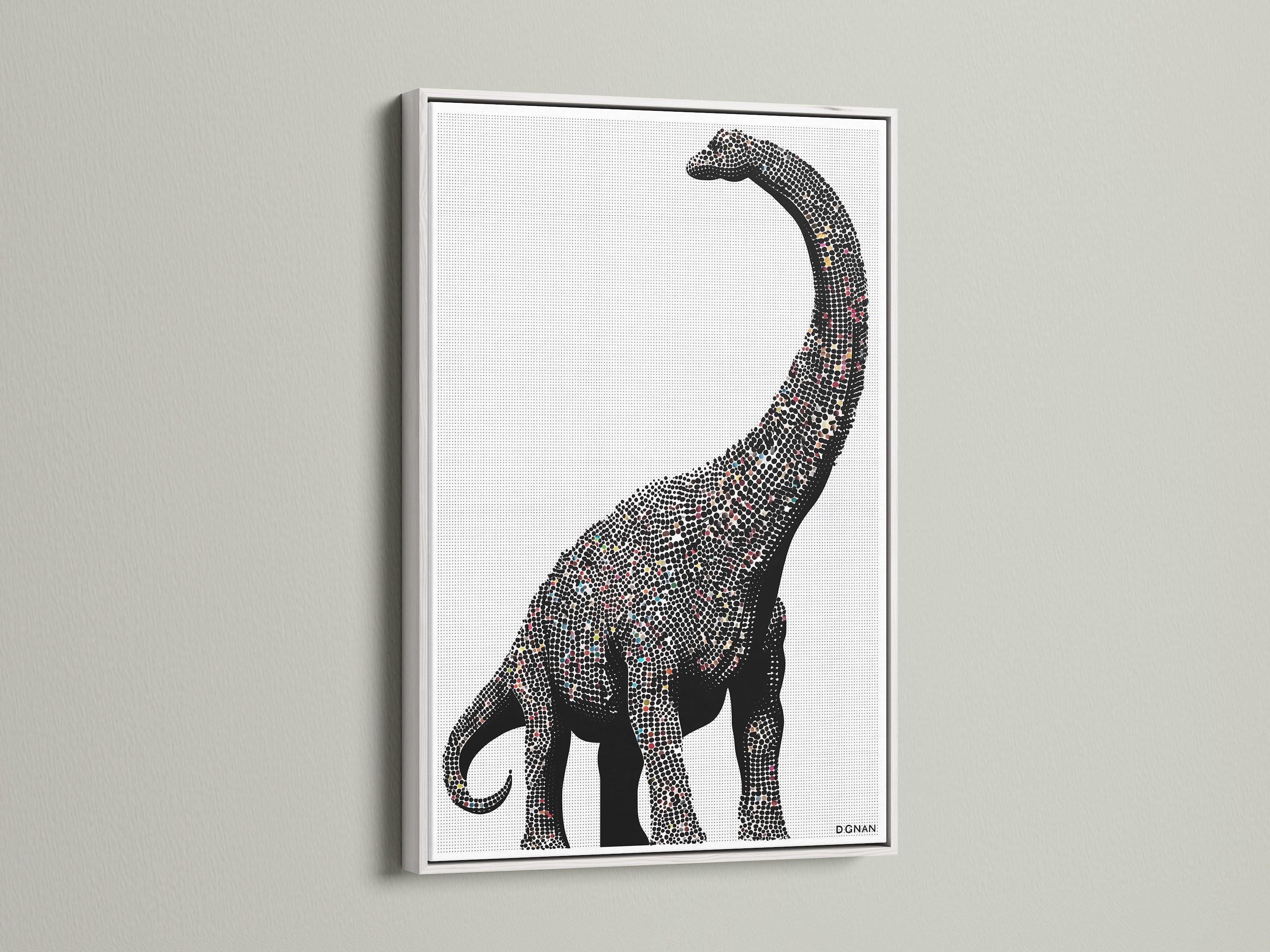 Dinosaur wall art featuring a minimalist brontosaurus canvas print. It is perfect modern nursery decor for a kids room. The artwork has a white frame. This sauropod artwork is great for children's boutiques and pediatric clinics.