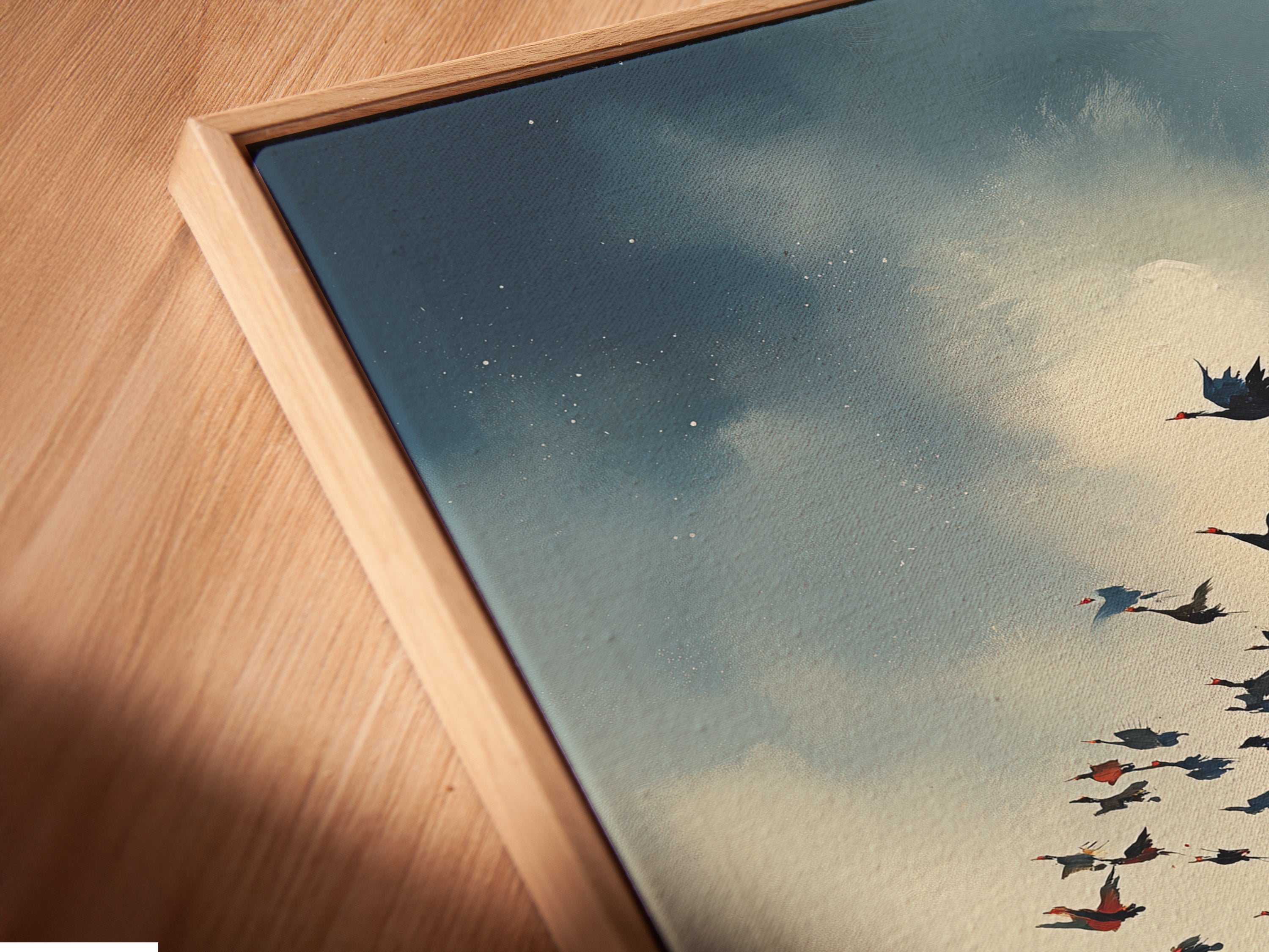 Close-up of the Birds in Flight canvas print in a floating frame. This contemporary framing style adds depth to the artwork. The floating frame enhances the rustic nature print. See the fine details of this autumn landscape. Ideal for showcasing this beautiful bird artwork.