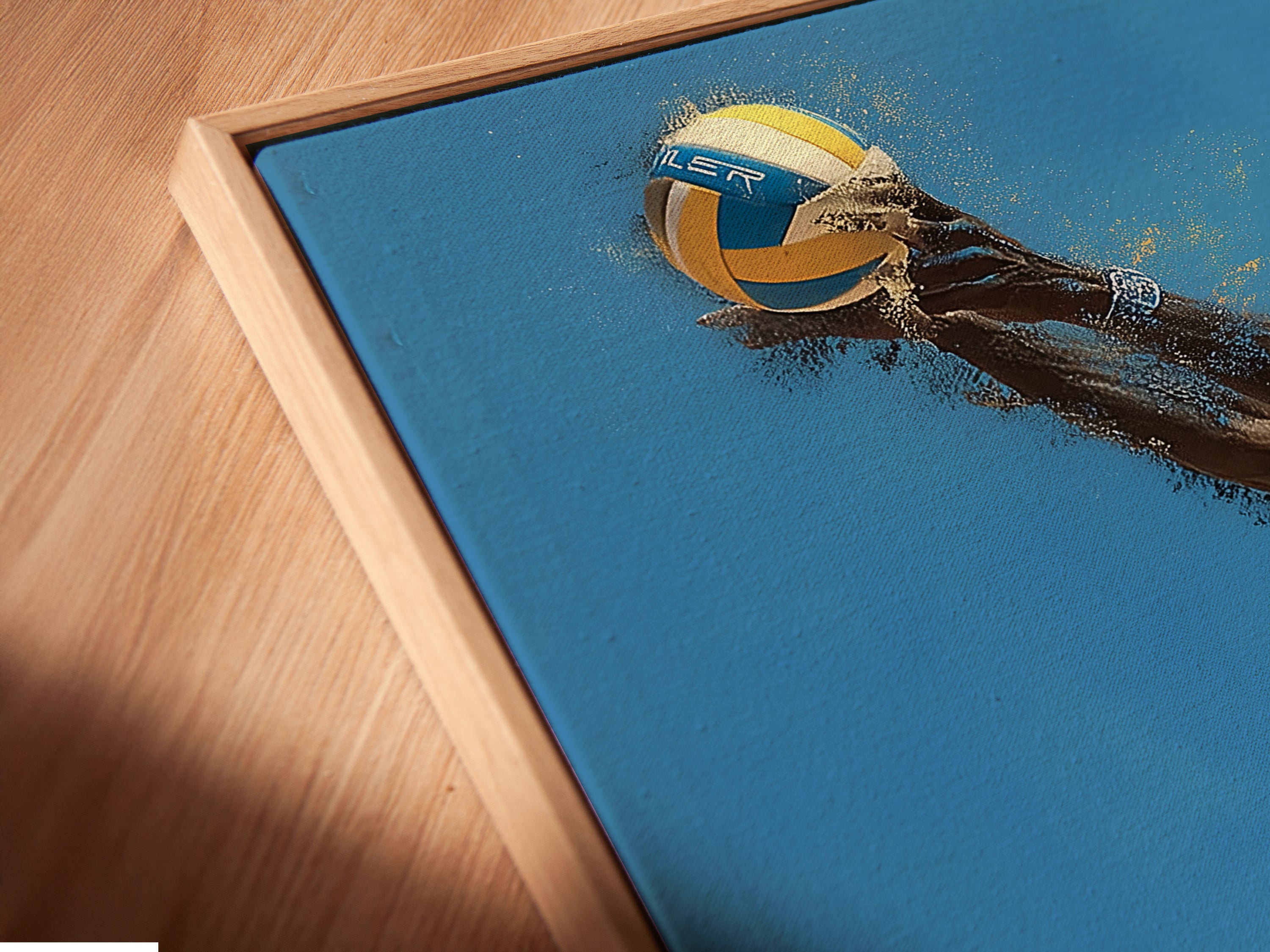 Close up of a volleyball sports canvas print in a floating frame. The floating frame gives the illusion that the artwork is suspended. It adds a contemporary touch to any room. Ideal for modern art lovers.