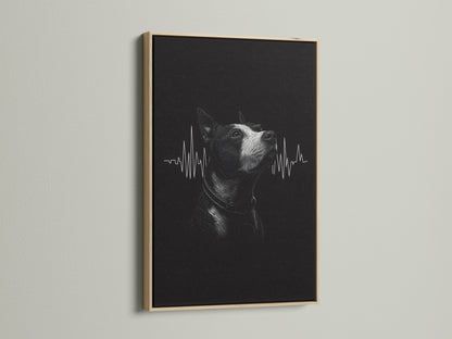 A close-up showcases a dog heartbeat art print in an oak frame. The artwork's modern style makes it suitable for a vet clinic or pet lover's home. This framed art offers a warm touch.