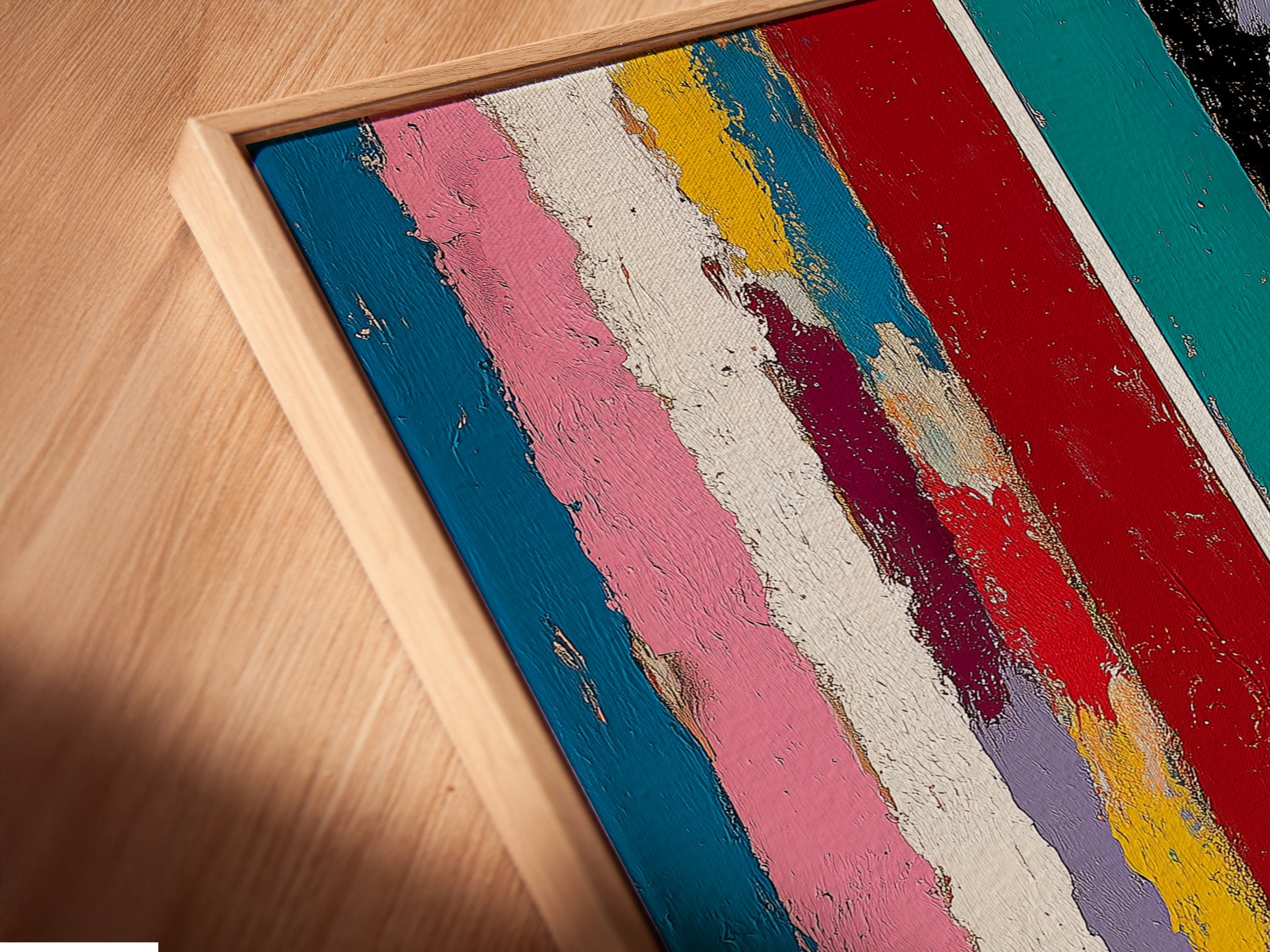 A close-up of a canvas print in a floating frame reveals its intricate details. The abstract stripe artwork features rainbow colors and vertical lines. This modern art is perfect for adding a contemporary touch to your interior decor.