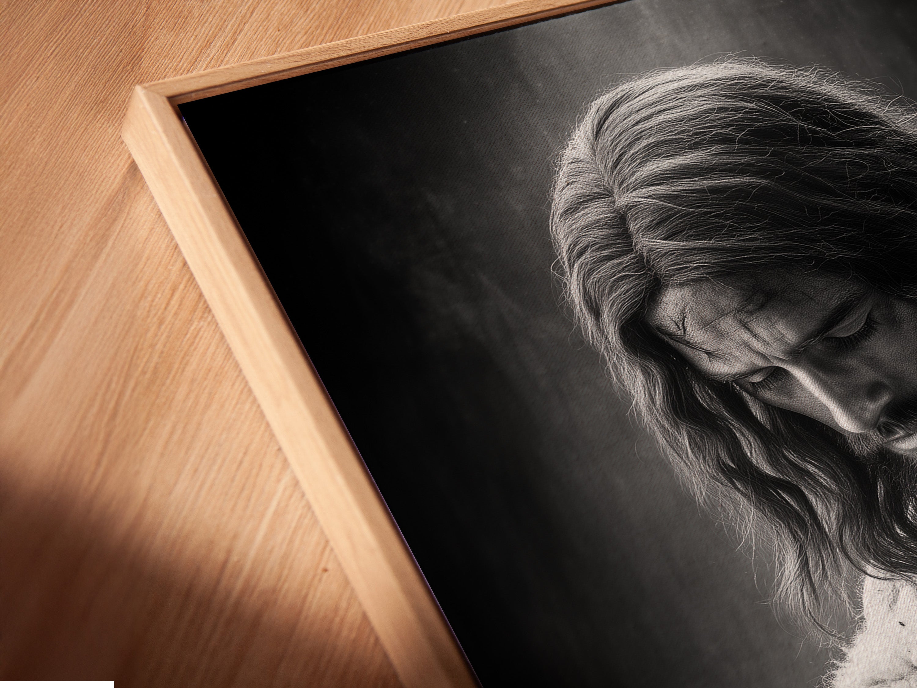 This is an angled close-up of a canvas print in a floating frame. The floating frame gives the art piece a modern and sophisticated look. The canvas print is stretched and ready to hang. The artwork appears to float within the frame.