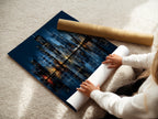 A woman carefully rolls a fine art poster paper print of the Chicago skyline. High quality materials ensure a lasting piece of urban photography. This cityscape art print is ready to frame. It's perfect for modern wall decor.