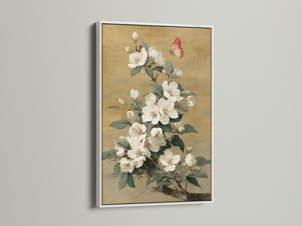 Classic botanical artwork with white flowers in a white frame. This vintage wall art will add elegance to your home decor. The flower artwork is perfect for a bedroom or living room. This botanical art complements vintage farmhouse traditional or eclectic styles.