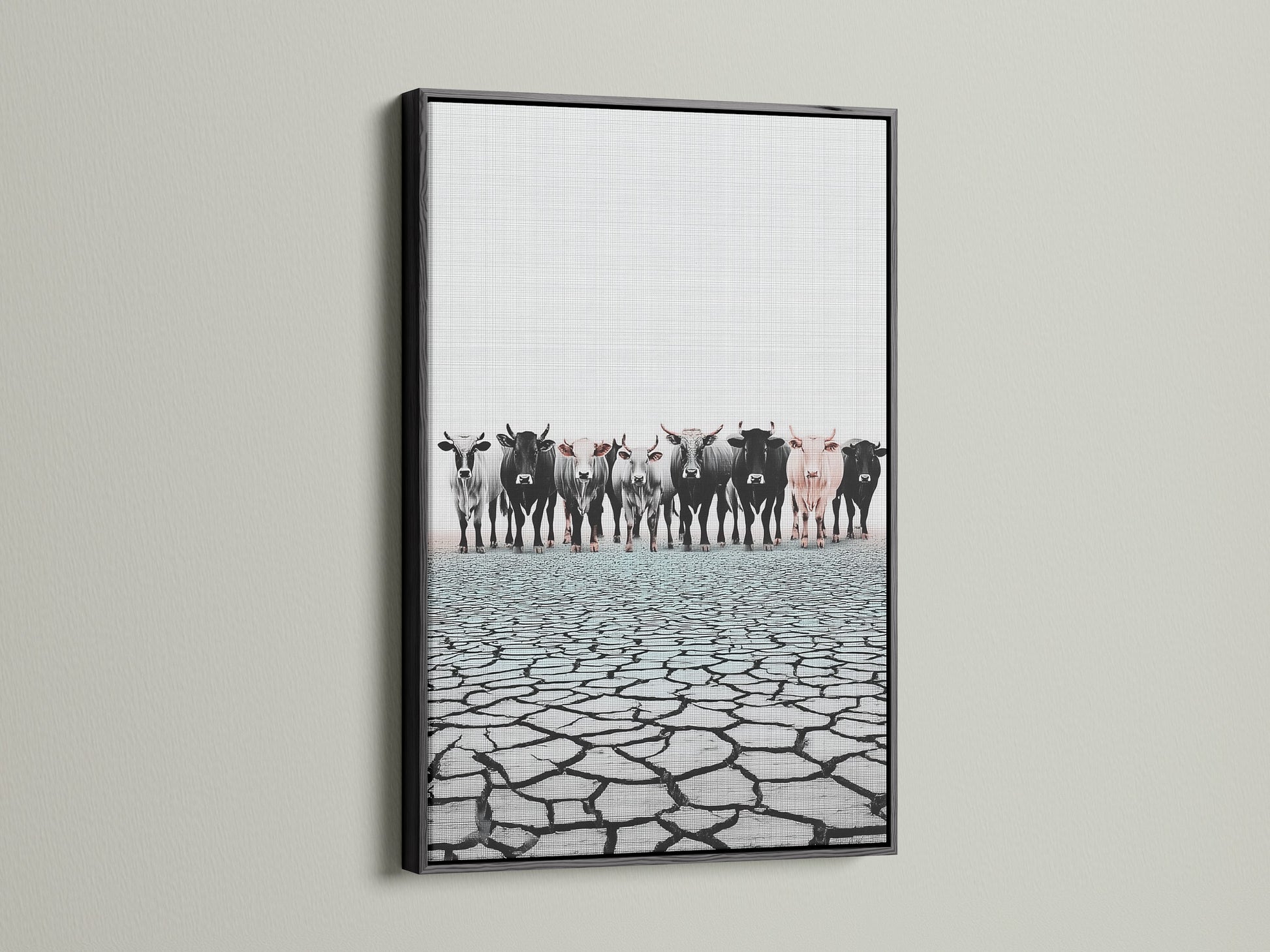 Cattle canvas print in a black frame. This rustic wall art complements any space. Black frame enhances the black and white animal canvas. Elevate your decor with black framed art.