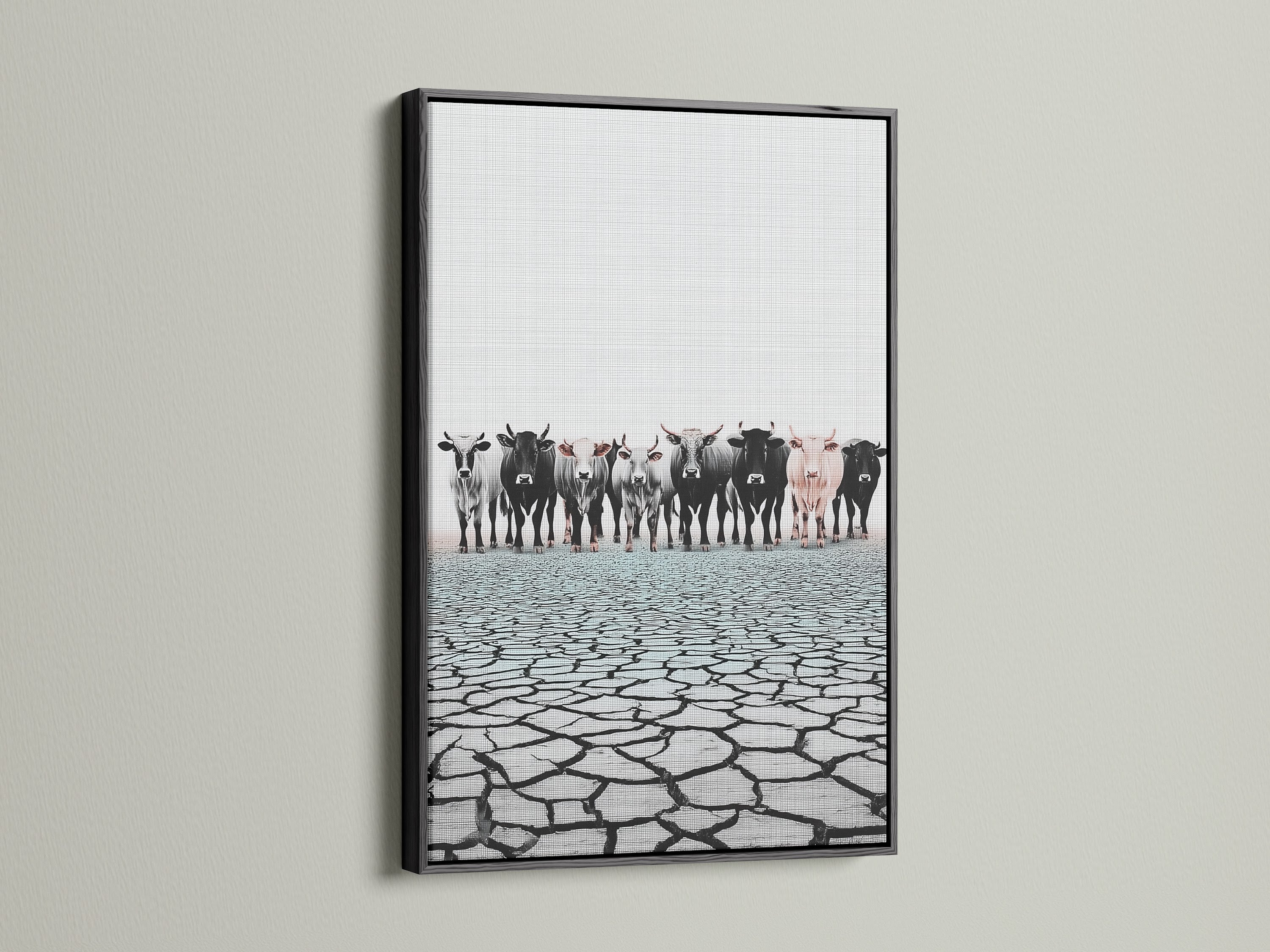 Cattle canvas print in a black frame. This rustic wall art complements any space. Black frame enhances the black and white animal canvas. Elevate your decor with black framed art.