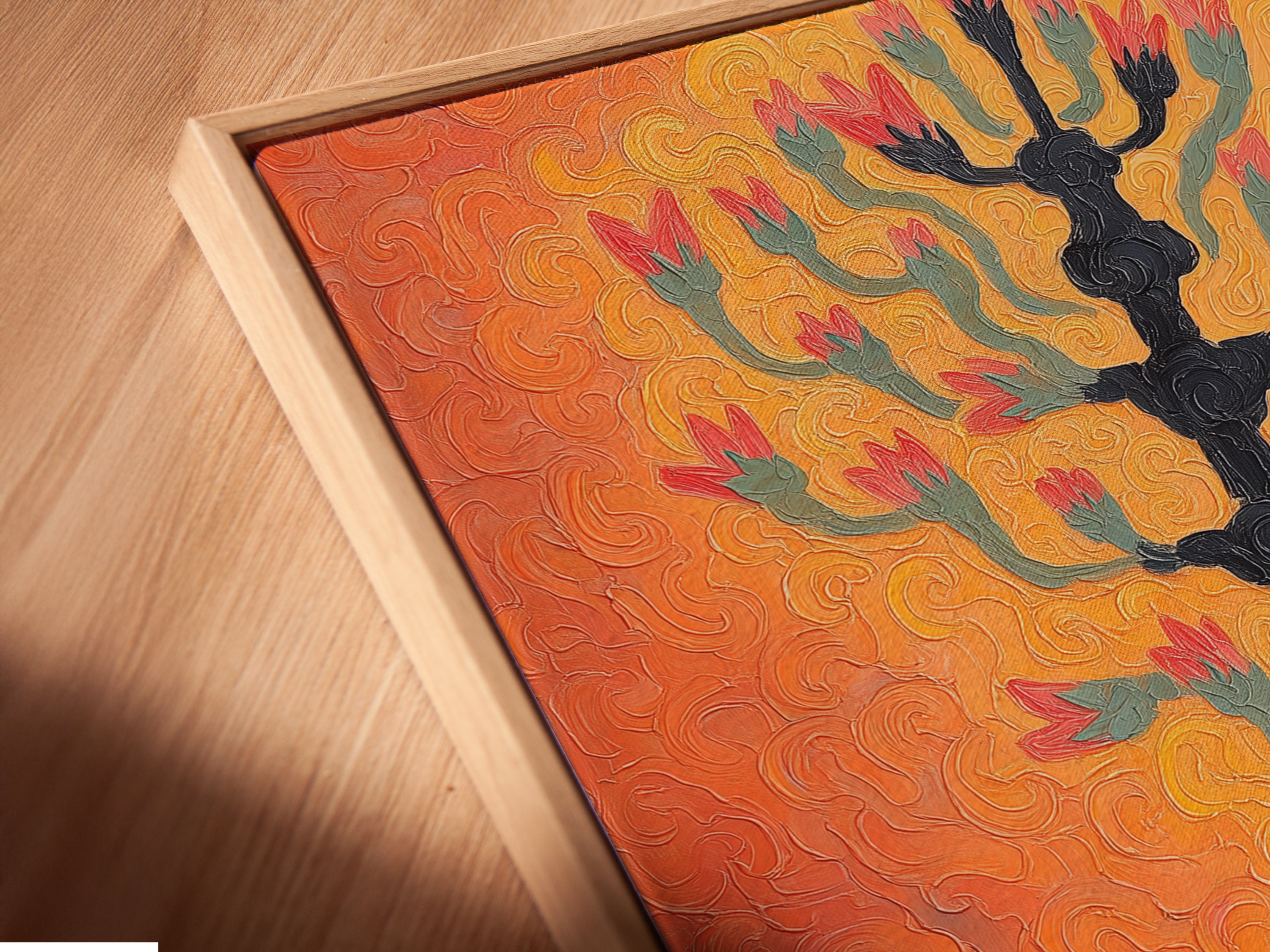 A close-up view of botanical tree artwork. The textured coral wall art background is set within a floating frame. This modern floral artwork enhances any room adding depth and style. Decorate your walls today. Perfect as entryway art.