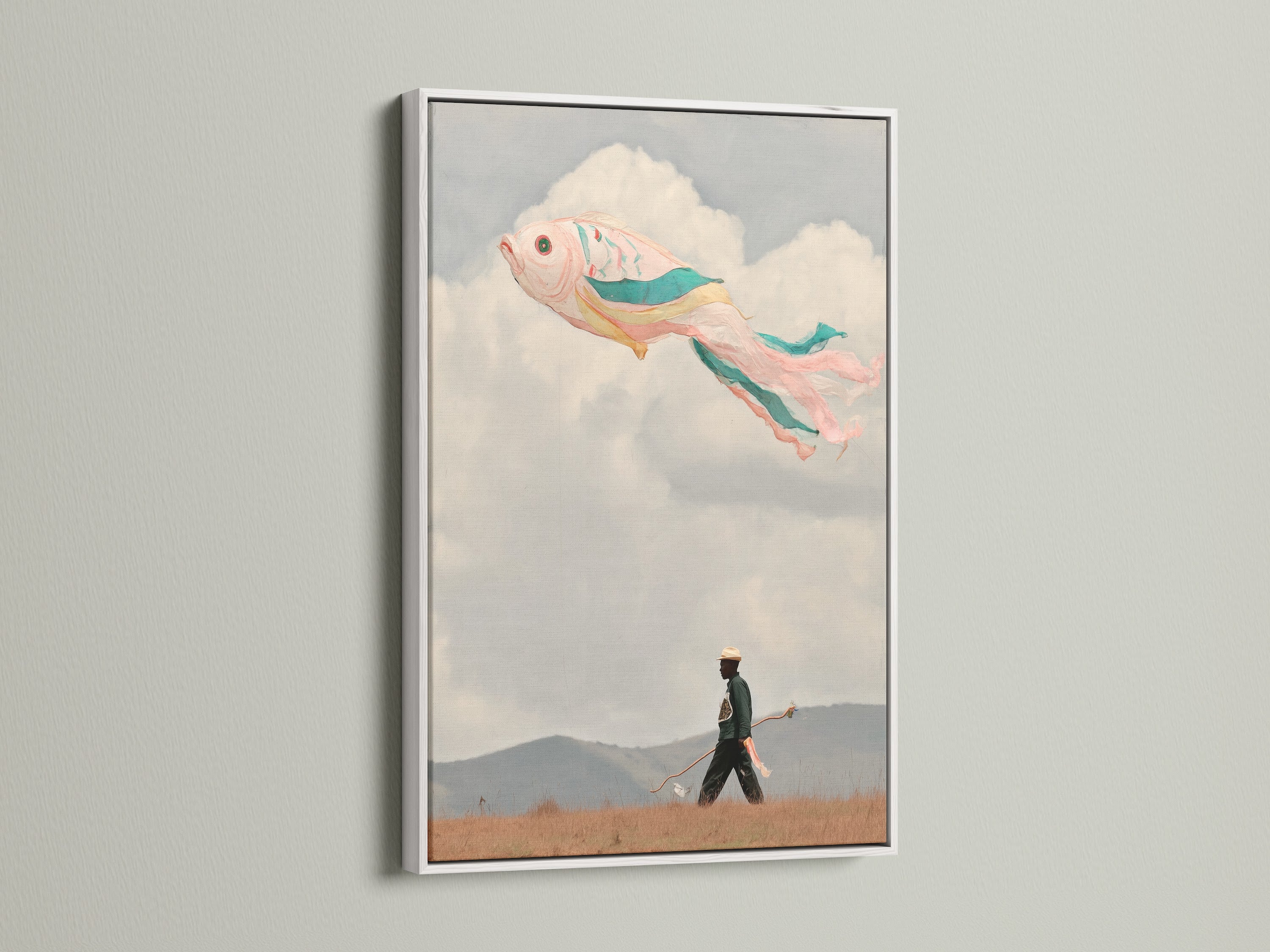 A white frame displays a surreal fish kite artwork. This dreamy wall art is a whimsical print. It's perfect for kids room decor or playroom art. The fantasy art adds a colorful touch.