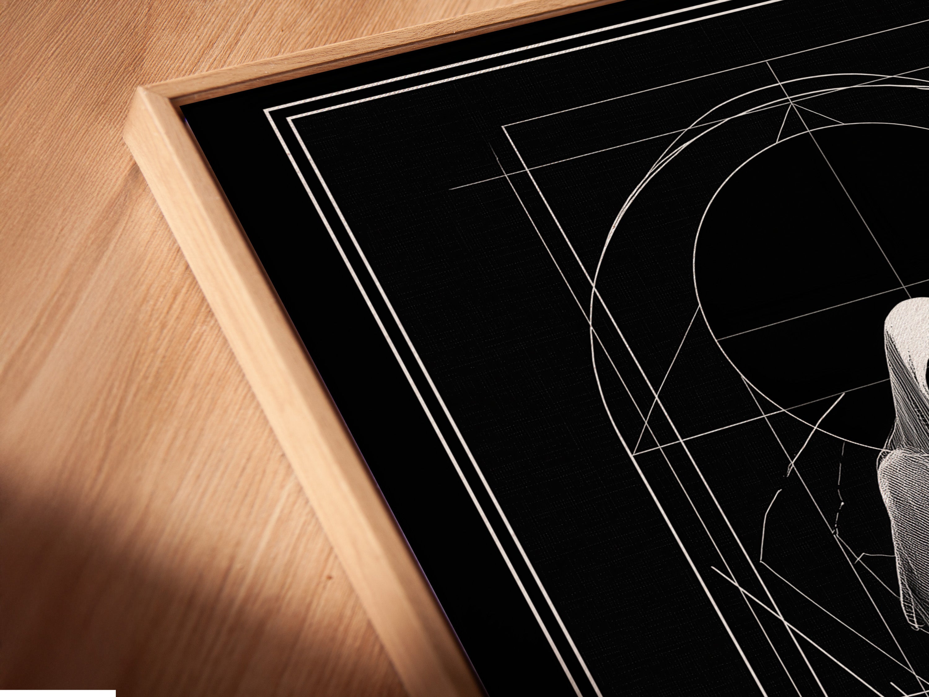 Angled close up of a canvas print in a floating frame. The art features a figure in a shroud. Geometric lines accent the piece. Floating frames add depth. Explore art options. Available on stretched canvas and fine art paper. Enhance your home decor today.