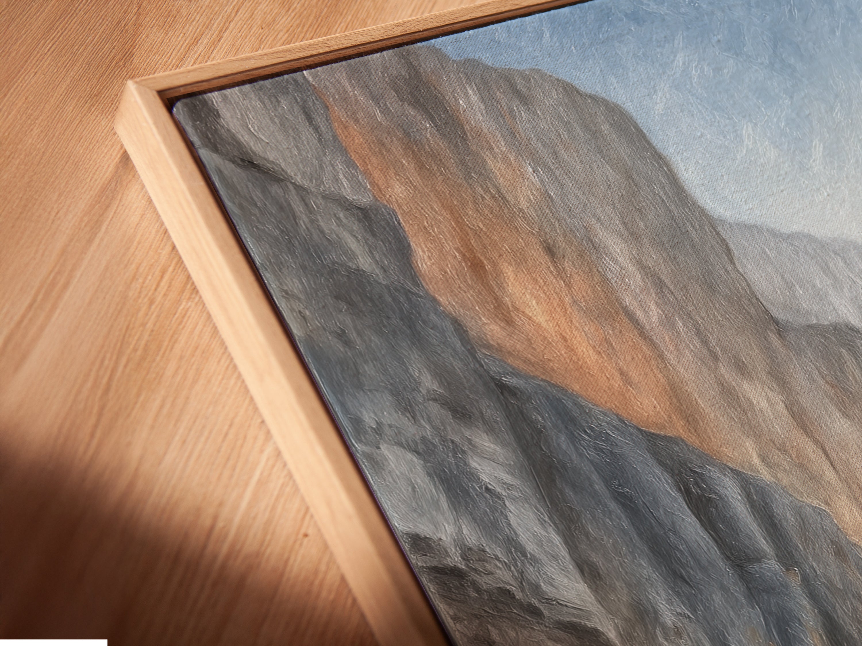 Close-up of a canyon canvas print in a floating frame. The artwork adds depth and sophistication. Ideal for homeowners and renters looking for modern wall art. The neutral tones complement minimalist interiors. Perfect for living rooms.