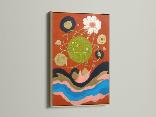 This cosmic abstract art print features celestial wall art. The artwork is displayed in an oak frame. The modern surreal canvas art has an abstract collage. It is a colorful abstract that would elevate your living room decor.