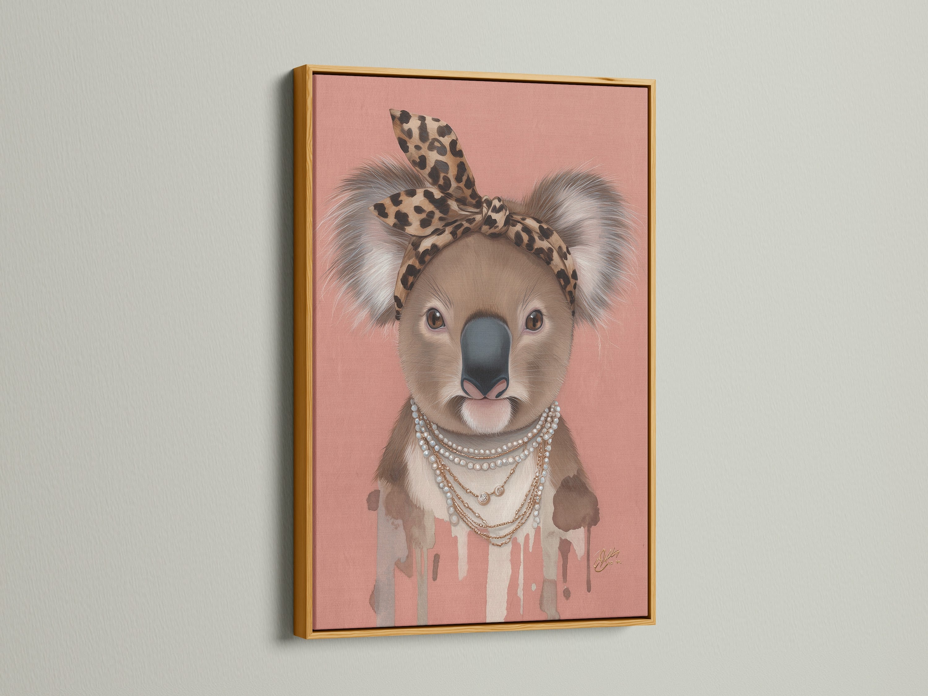 Gold Frame features the Koala Wall Art. This animal canvas print is ideal for nurseries and eclectic spaces. The Koala wears a leopard print headband and pearl necklace. It is a cute and stylish animal artwork.