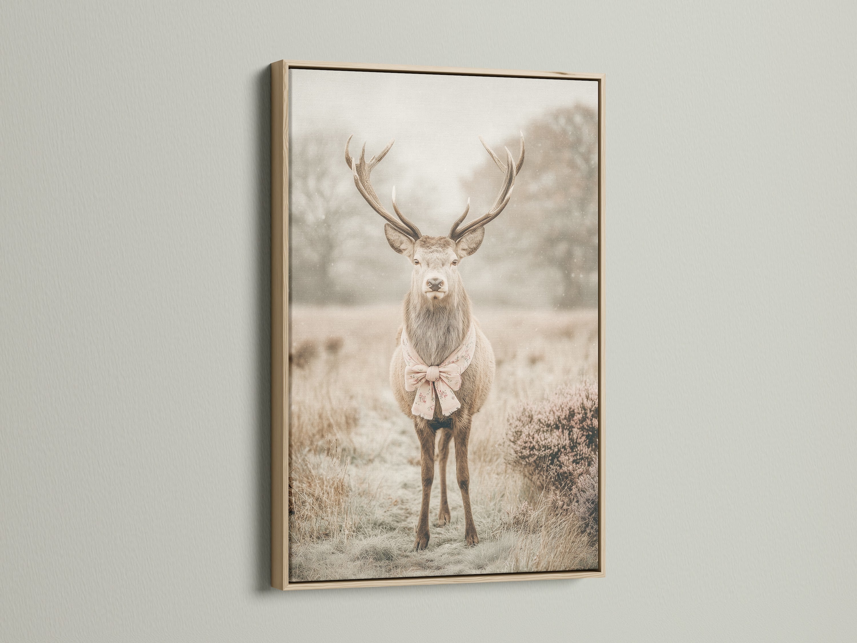 This artwork features a deer with a bow tie in an oak frame. The oak frame enhances the vintage animal wall art. Ideal woodland nursery decor for a charming bedroom. It's a perfect piece of Rustic Wall Art that complements country vintage or eclectic decor styles. The beige and brown colors create a warm inviting atmosphere.
