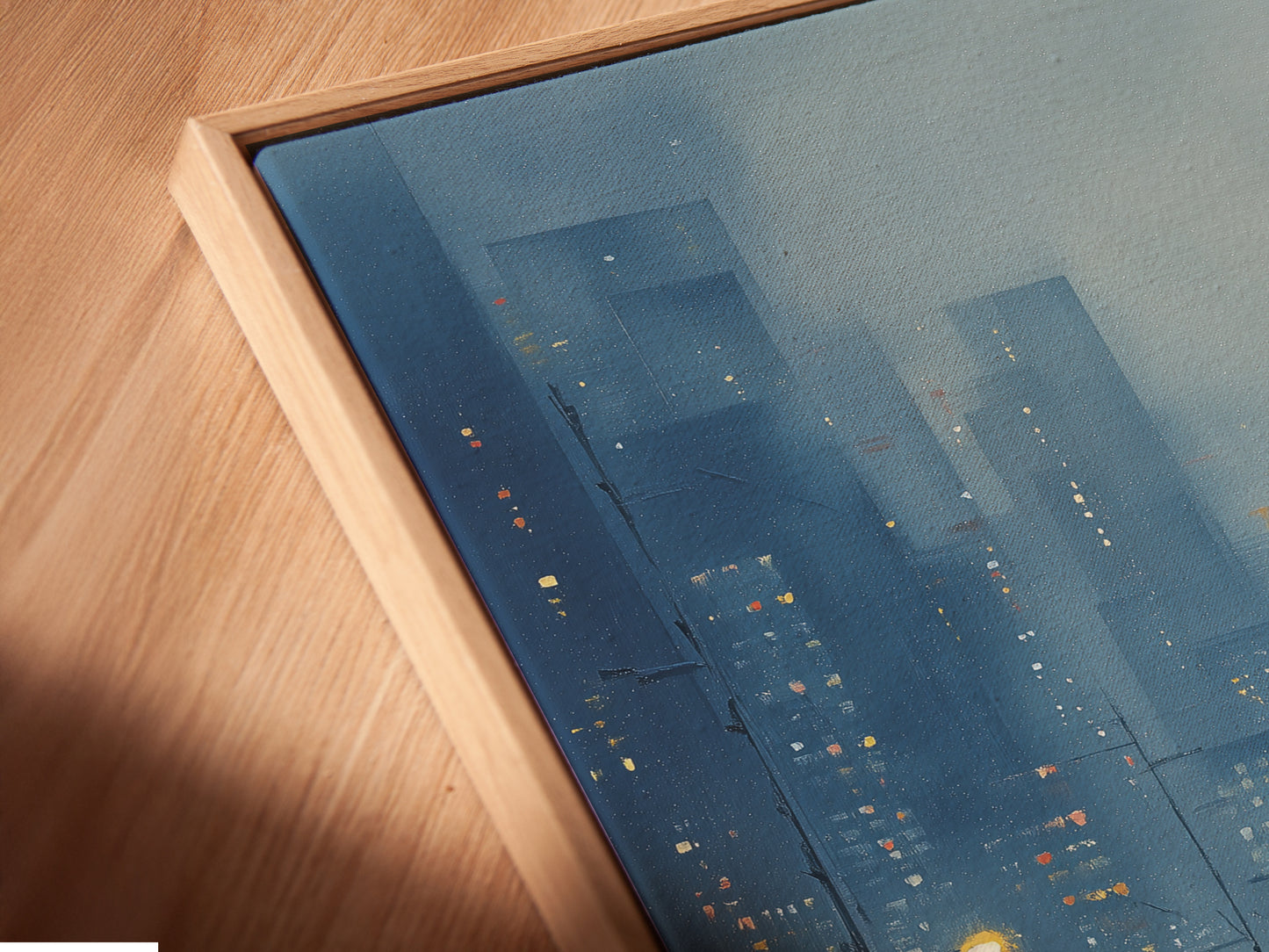 See a close-up of our canvas print in a floating frame. The angled view highlights the modern urban cityscape. The rainy day artwork adds a touch of blue tones. This piece is perfect for office wall decor. It enhances any contemporary space with its unique style. Experience the detail