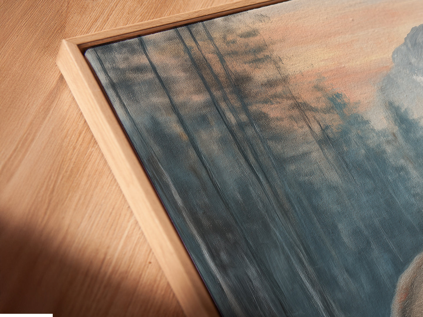 A close up of a canvas print in a floating frame. The artwork shows a bison and its calf. This adds depth and sophistication. Perfect for wildlife canvas art and rustic decor enthusiasts.