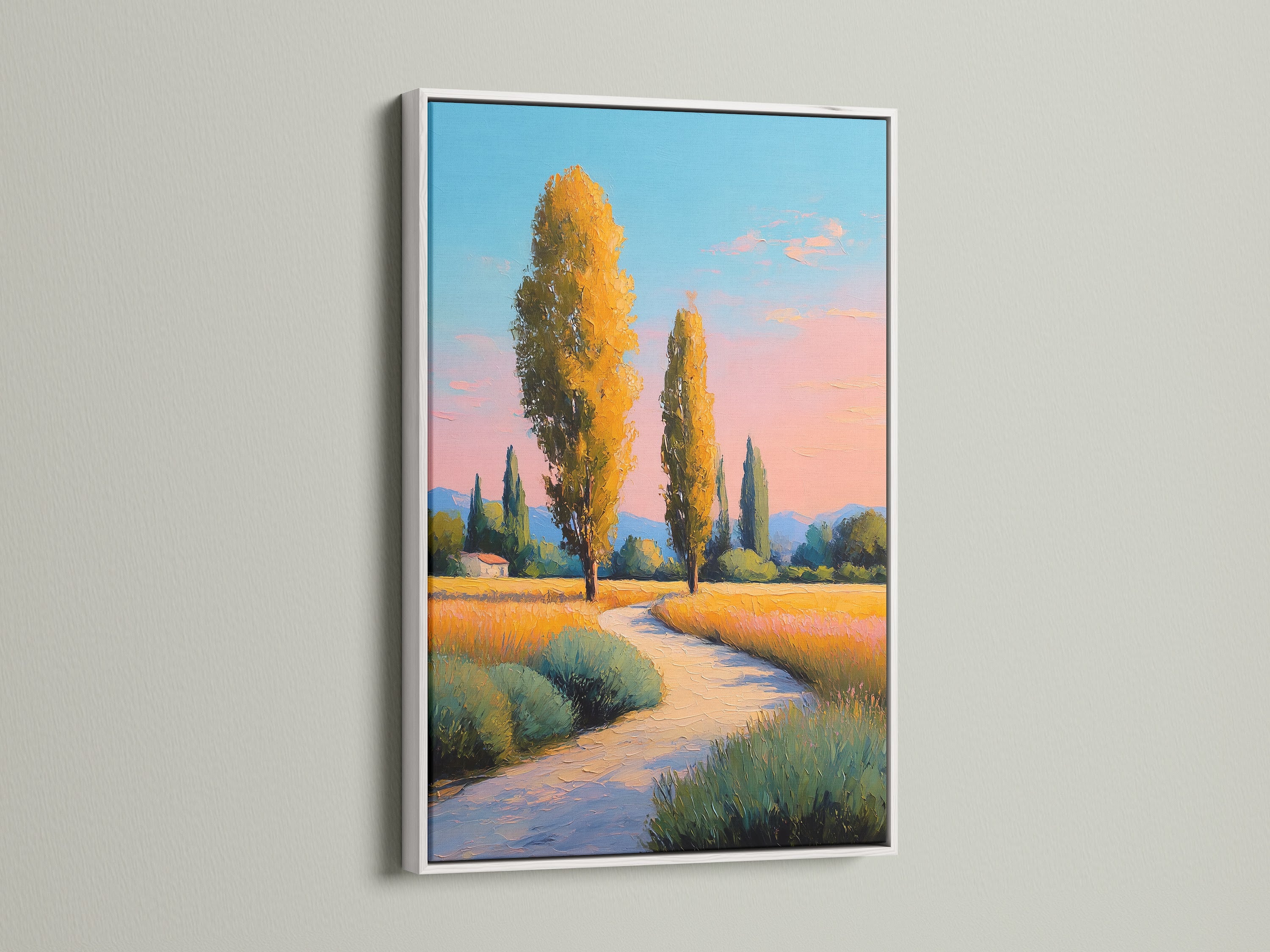 White frame featuring a Tuscany Landscape artwork. This nature wall art complements any living space. The golden hour art adds warmth to bedroom wall decor. The rural landscape evokes a sense of tranquility.