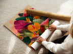 A woman is carefully rolling a fine art poster paper. She is handling the paper with care. This demonstrates the delicate nature of fine art prints. The poster paper is smooth and high-quality. It is perfect for creating stunning artworks.
