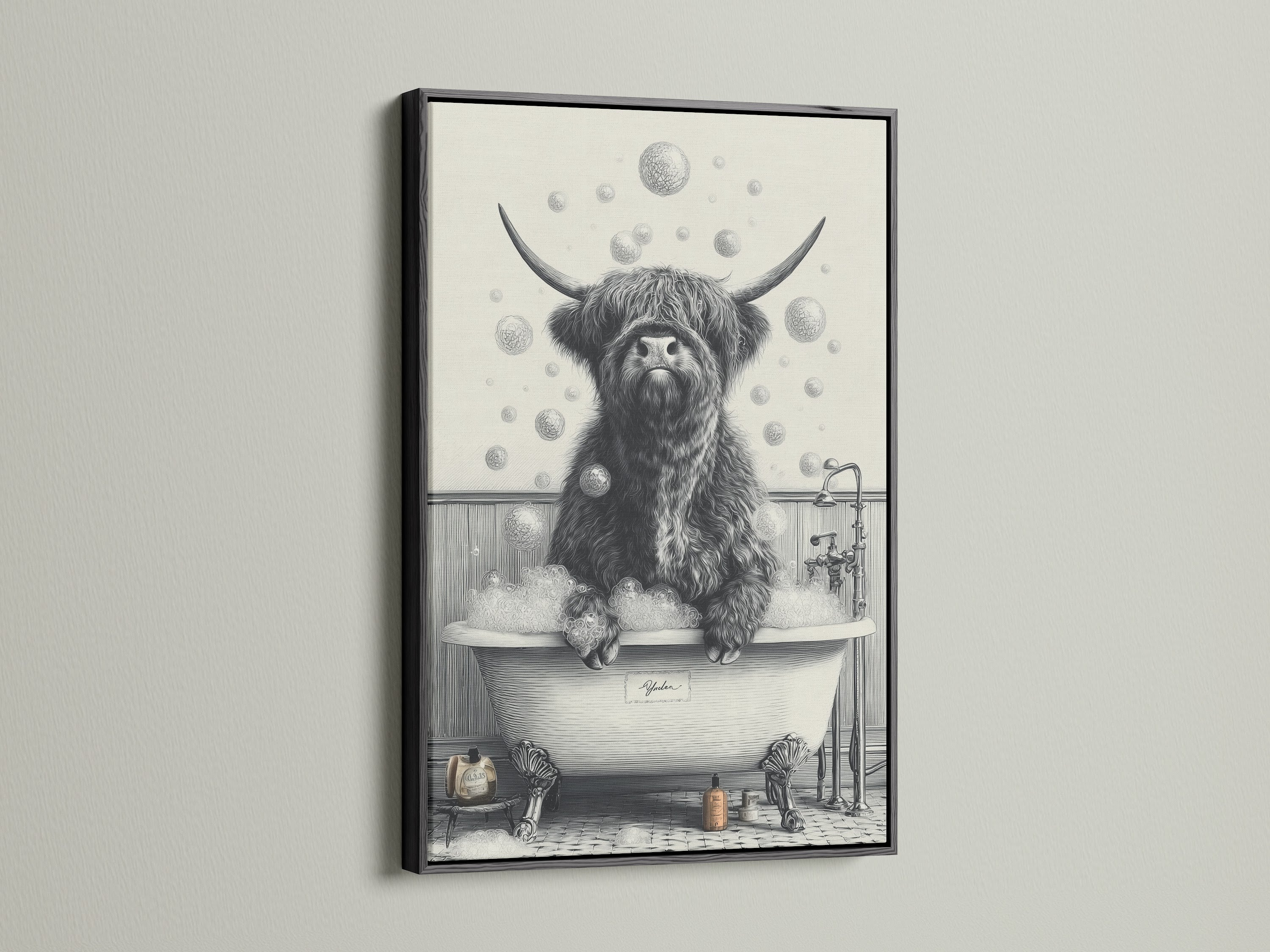 A black frame displays the Highland Cow in Tub artwork. This unique farmhouse wall art features a Scottish cow in a bathtub. It is a perfect choice for bathroom art. This quirky wall art brings a touch of humor to your home.