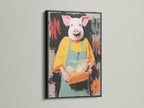 Pig Baker canvas print in a black frame. This funny animal artwork is a perfect addition to your dining room. It is ideal kitchen wall decor. The art features a chef pig. It is a whimsical art print.