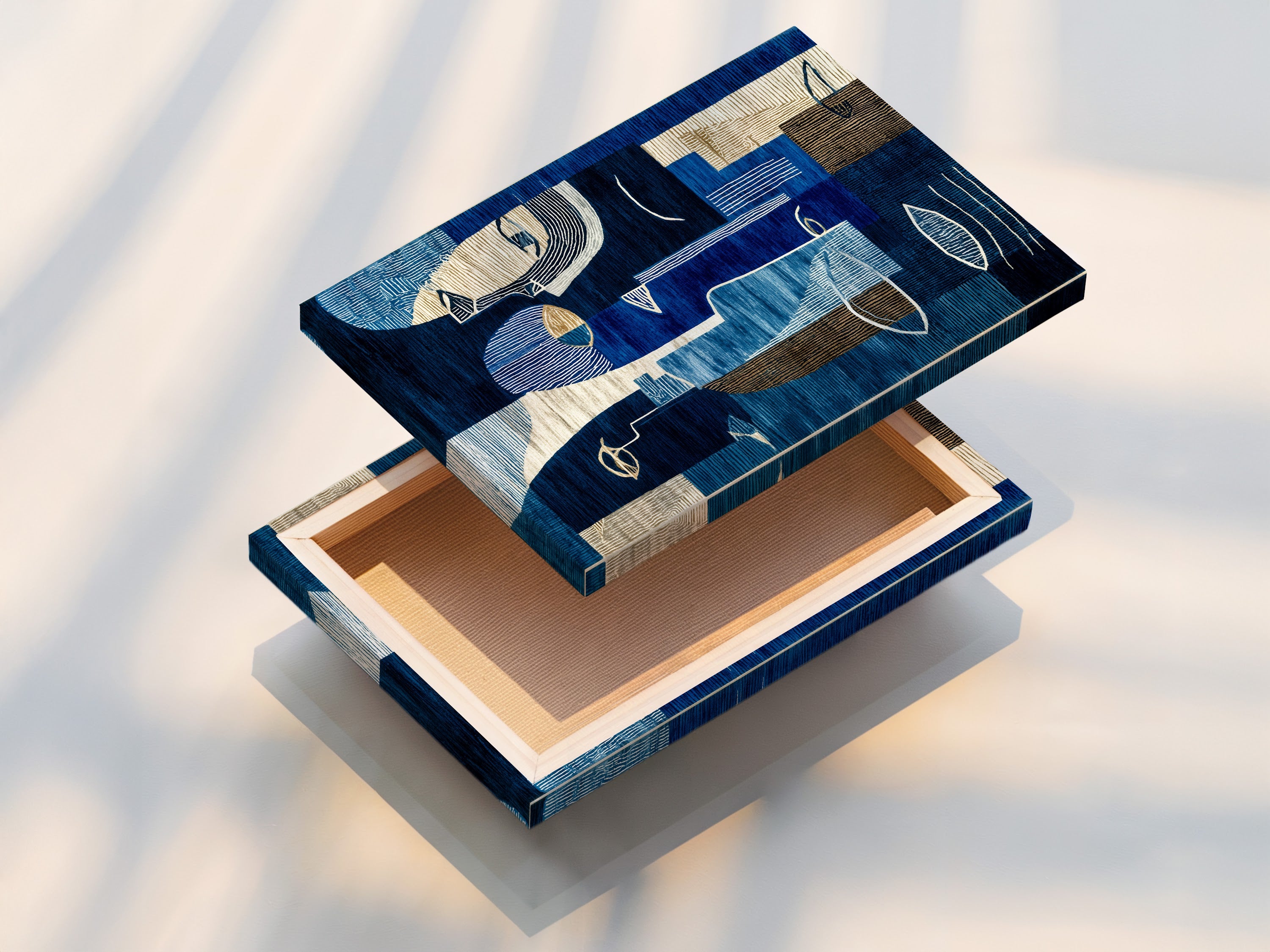 This is a stretched canvas print of abstract blue art. The modern geometric artwork is ready to hang. It is a contemporary piece perfect for any wall. This navy and cream artwork enhances living spaces. Add style and sophistication to your space today