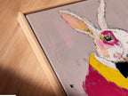 Angled close-up of a Rabbit Pianist canvas print in a floating frame. This contemporary mixed media artwork adds artistic charm to any room. Perfect for music enthusiasts seeking quirky wall decor. Explore this modern animal art now.