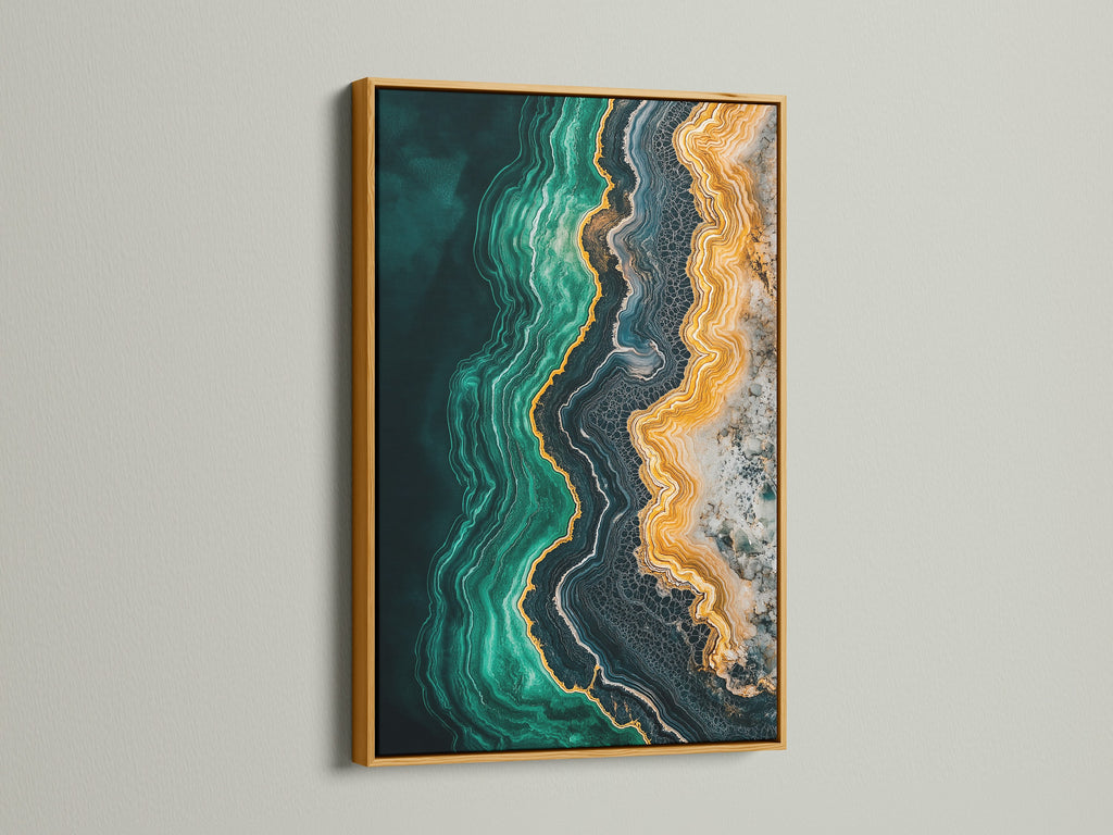 A beautiful abstract ocean artwork. The emerald green teal and gold create a luxurious fluid artwork. A gold frame adds a touch of glamour to this contemporary artwork. This ocean canvas print is perfect for minimalist spaces.