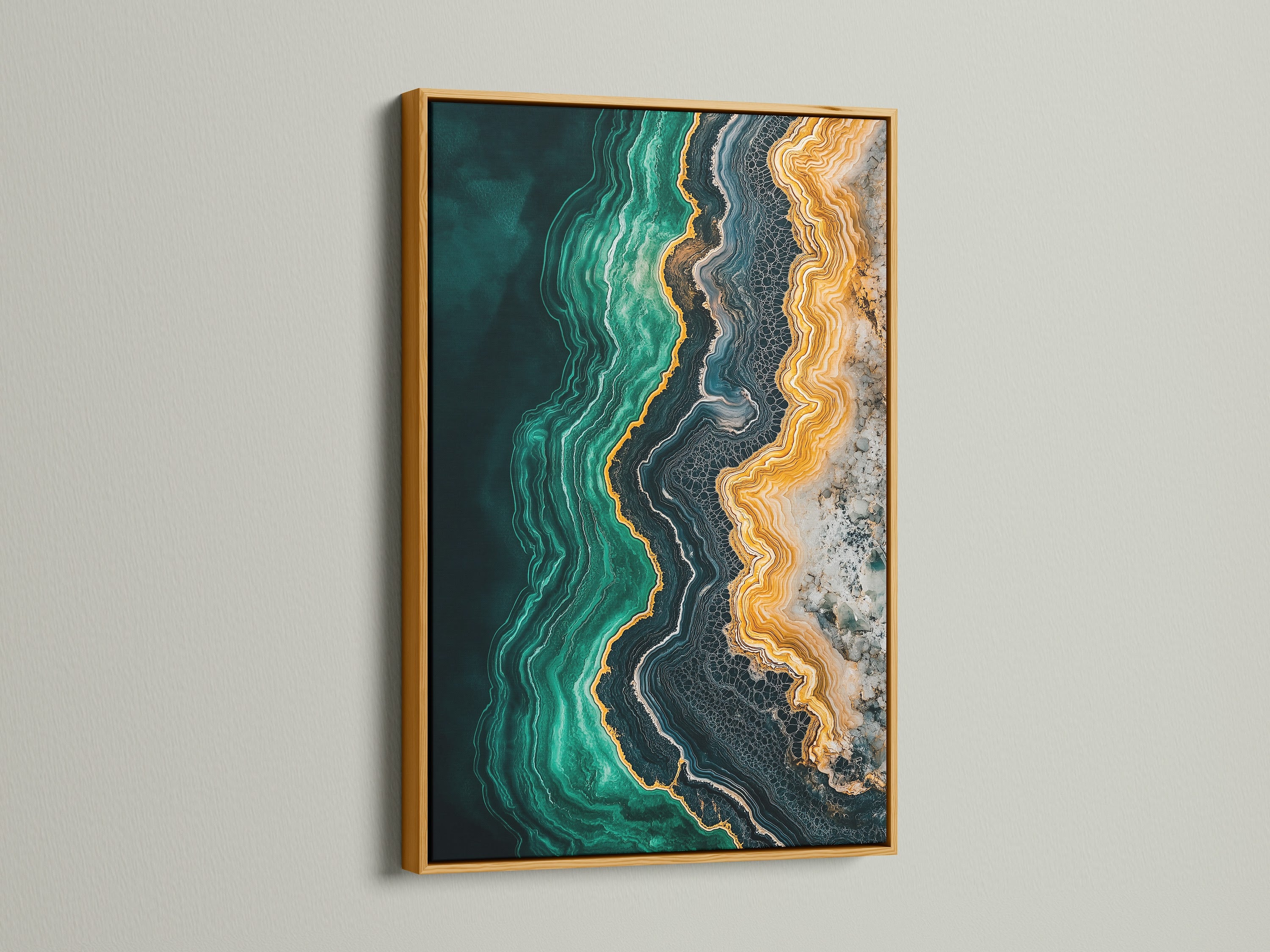 A beautiful abstract ocean artwork. The emerald green teal and gold create a luxurious fluid artwork. A gold frame adds a touch of glamour to this contemporary artwork. This ocean canvas print is perfect for minimalist spaces.